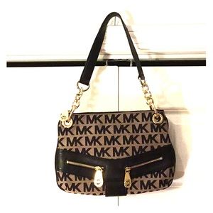 Michael Korea’s black/gold shoulder cocktail bag